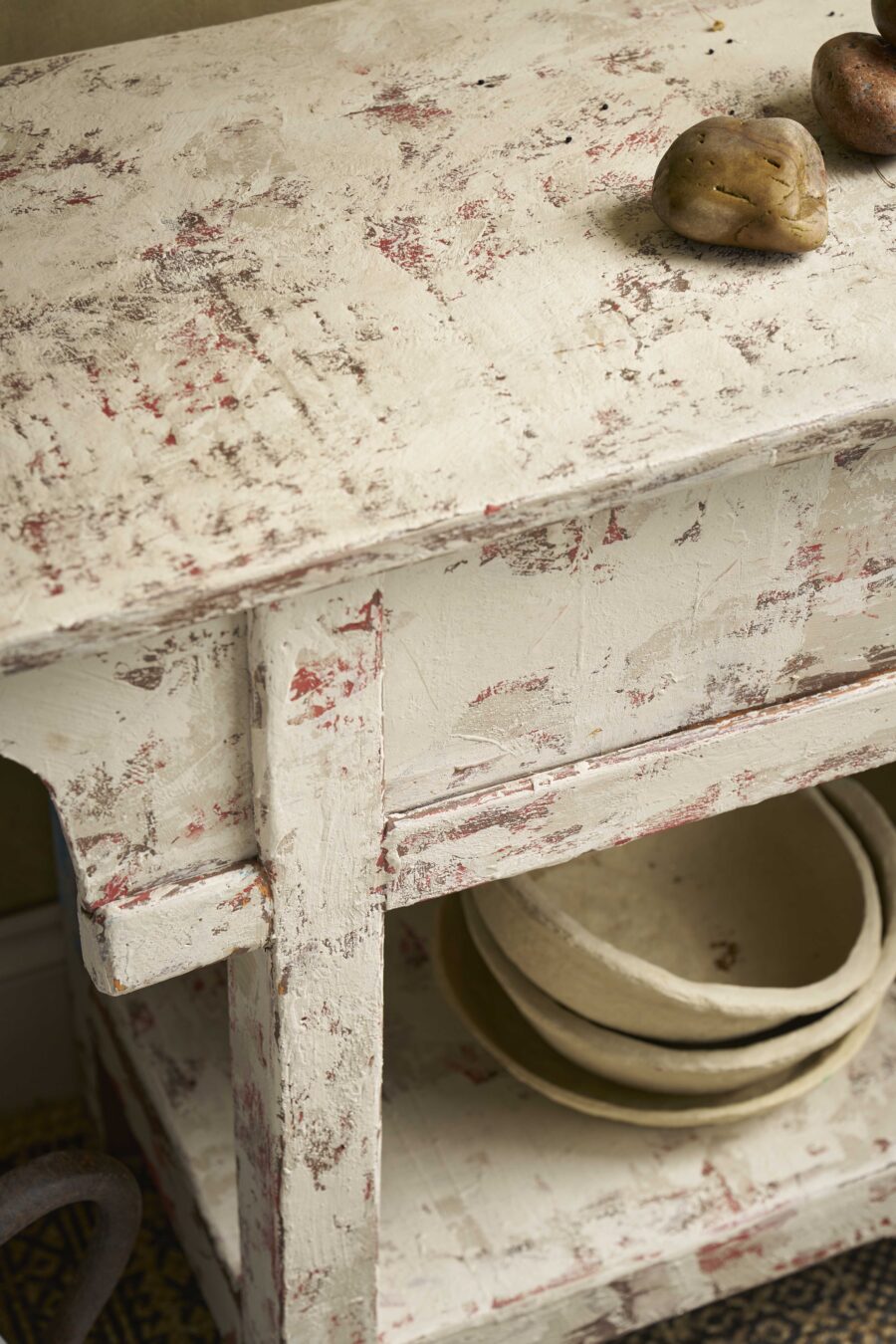 Weathered wooden table look created with Annie Sloan Chalk Paint in colour Canvas, with ceramic bowls inside, rustic setting
